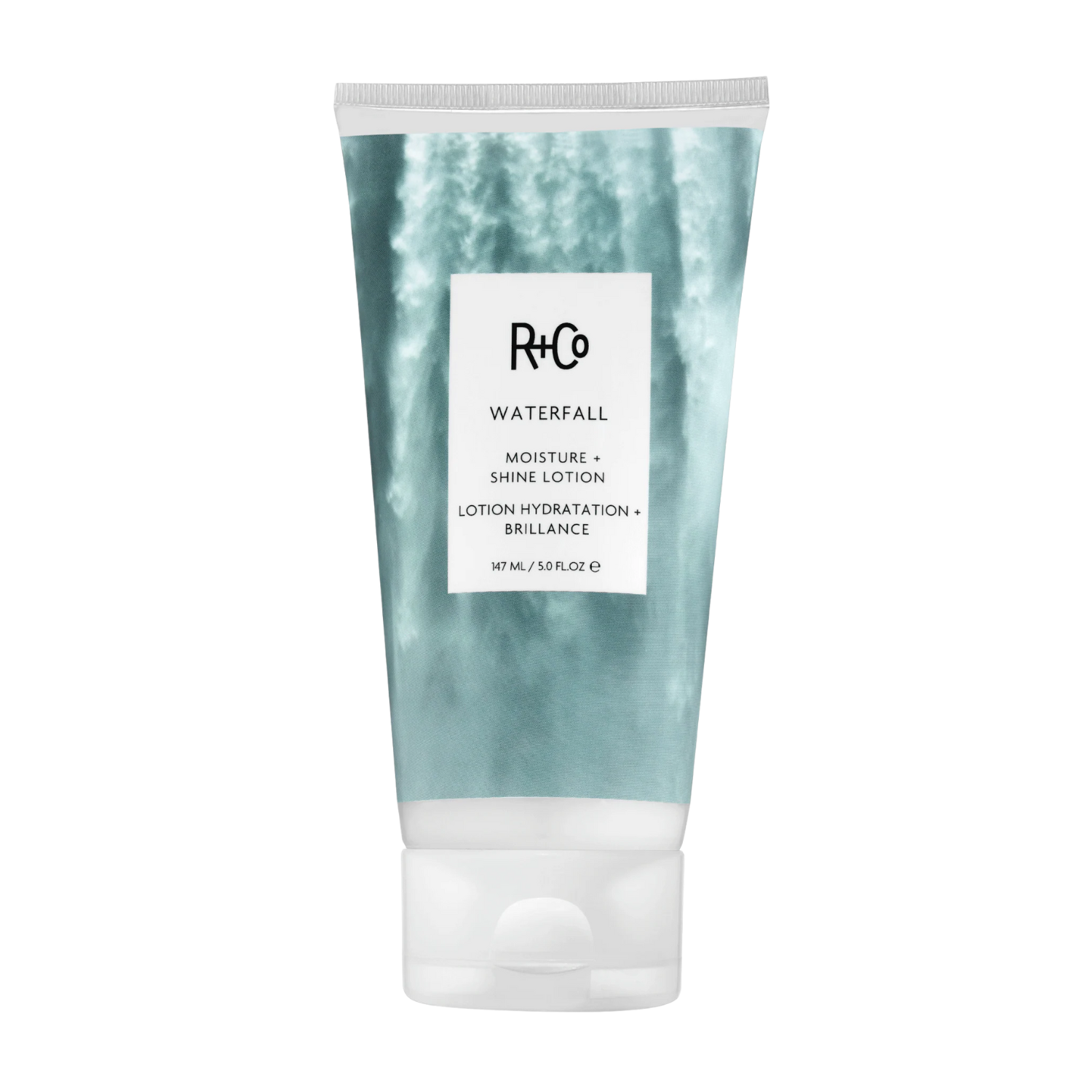 Flacon de la lotion Waterfall Moisture + Shine de R+Co, soin léger hydratant pour cheveux brillants et doux