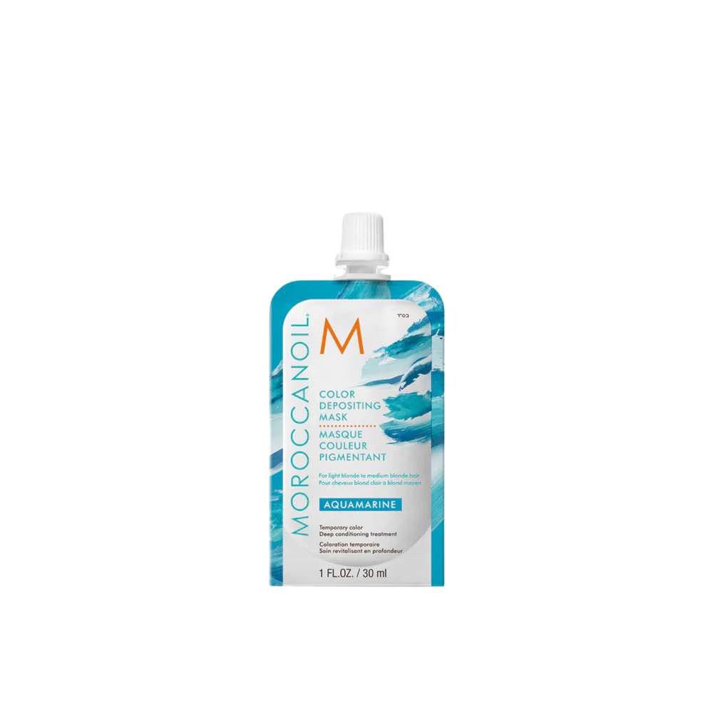 Pot du Masque Aquamarine Moroccanoil : crème capillaire bleu vibrant pour blond clair à mi‑blond, soin colorant temporaire et hydratant.

