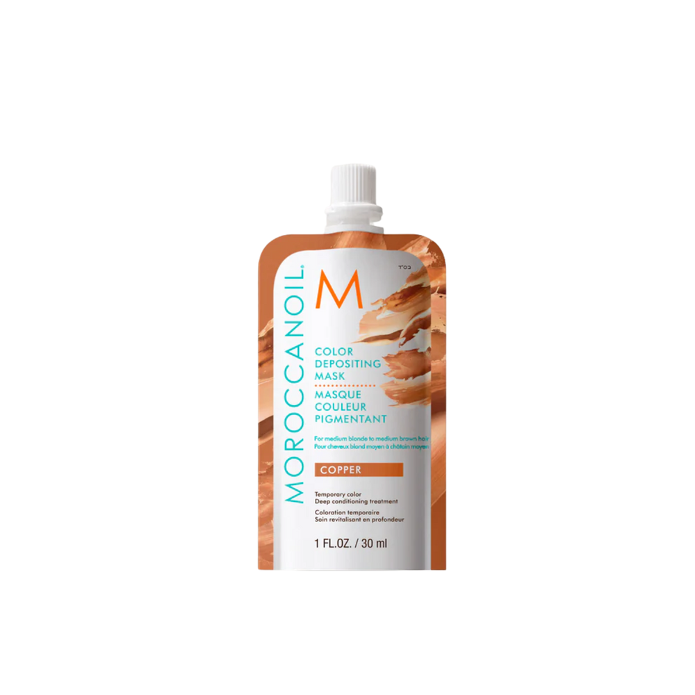 Pot de Masque Cuivre Moroccanoil Dépôt de Couleur : soin capillaire temporaire cuivré pour cheveux châtains à blonds foncés.

