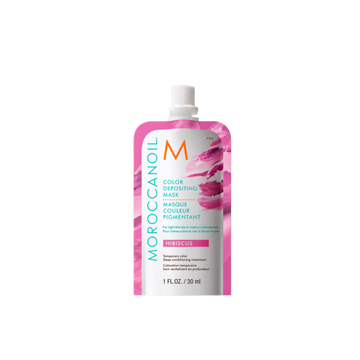 Pot du Masque Hibiscus Moroccanoil, crème capillaire rose floral pour cheveux blond clair à moyen, pigmentation temporaire et soin nourrissant.

