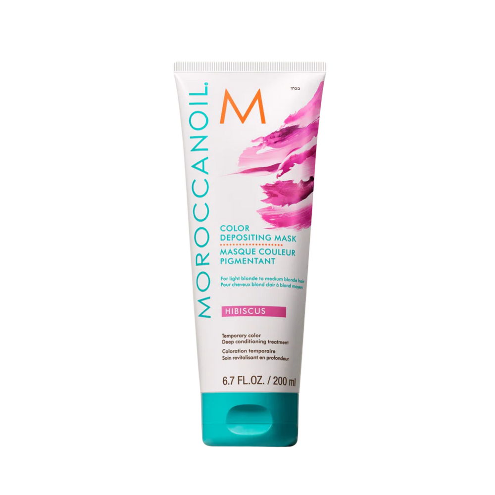 Pot du Masque Hibiscus Moroccanoil, crème capillaire rose floral pour cheveux blond clair à moyen, pigmentation temporaire et soin nourrissant.

