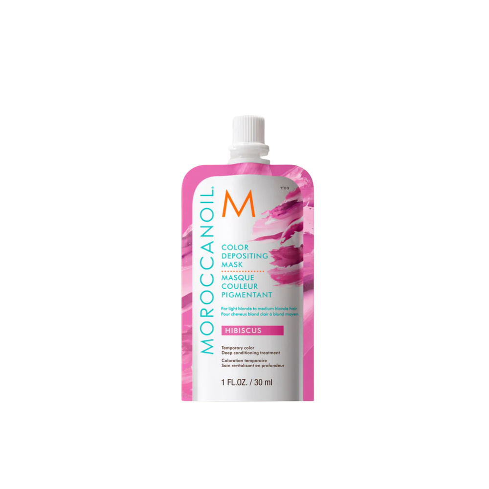 Pot du Masque Hibiscus Moroccanoil, crème capillaire rose floral pour cheveux blond clair à moyen, pigmentation temporaire et soin nourrissant.

