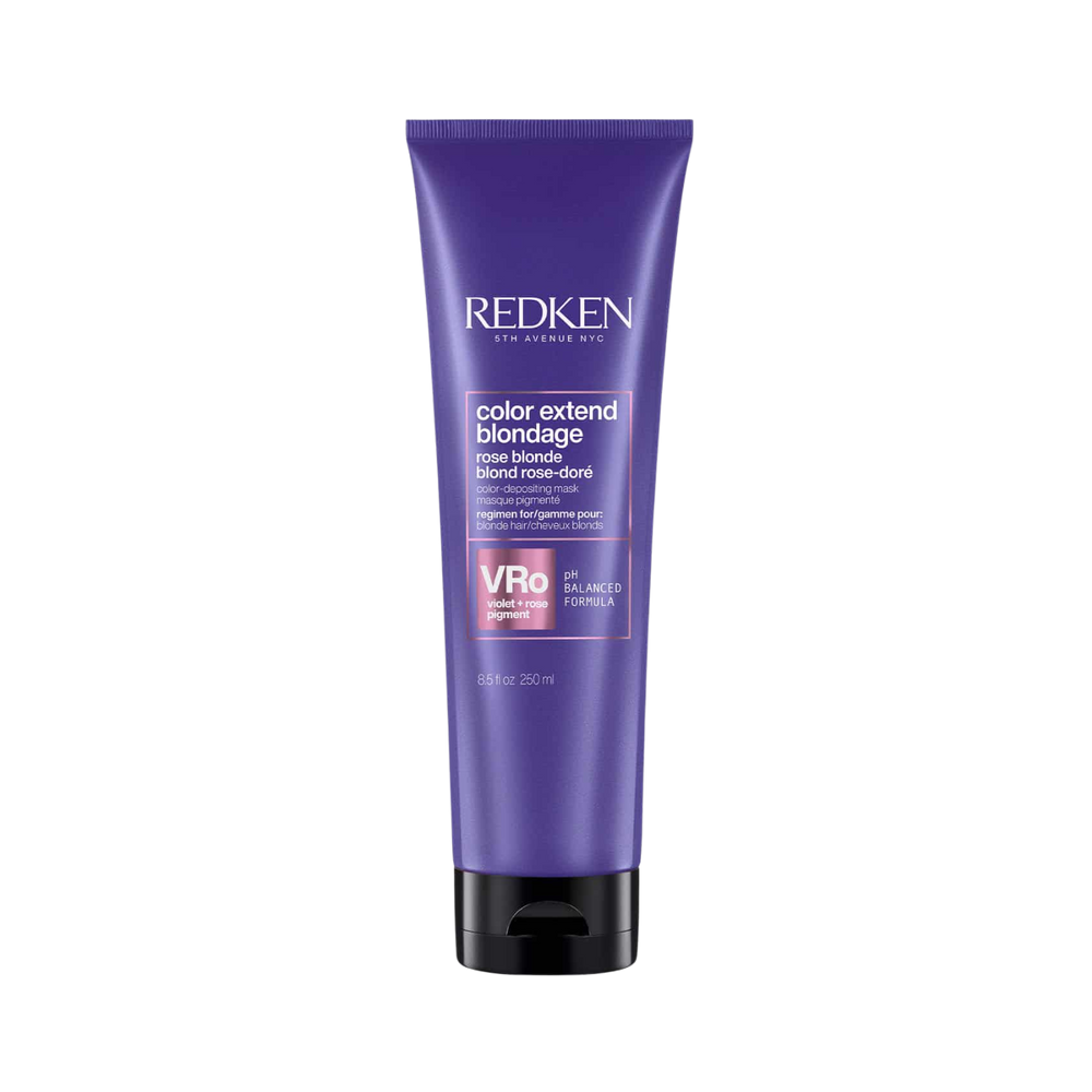 Pot du masque Redken Blondage rose posé sur fond blanc.