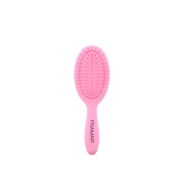 Mini brosse Framar rose — poils flexibles pour démêlage en douceur.