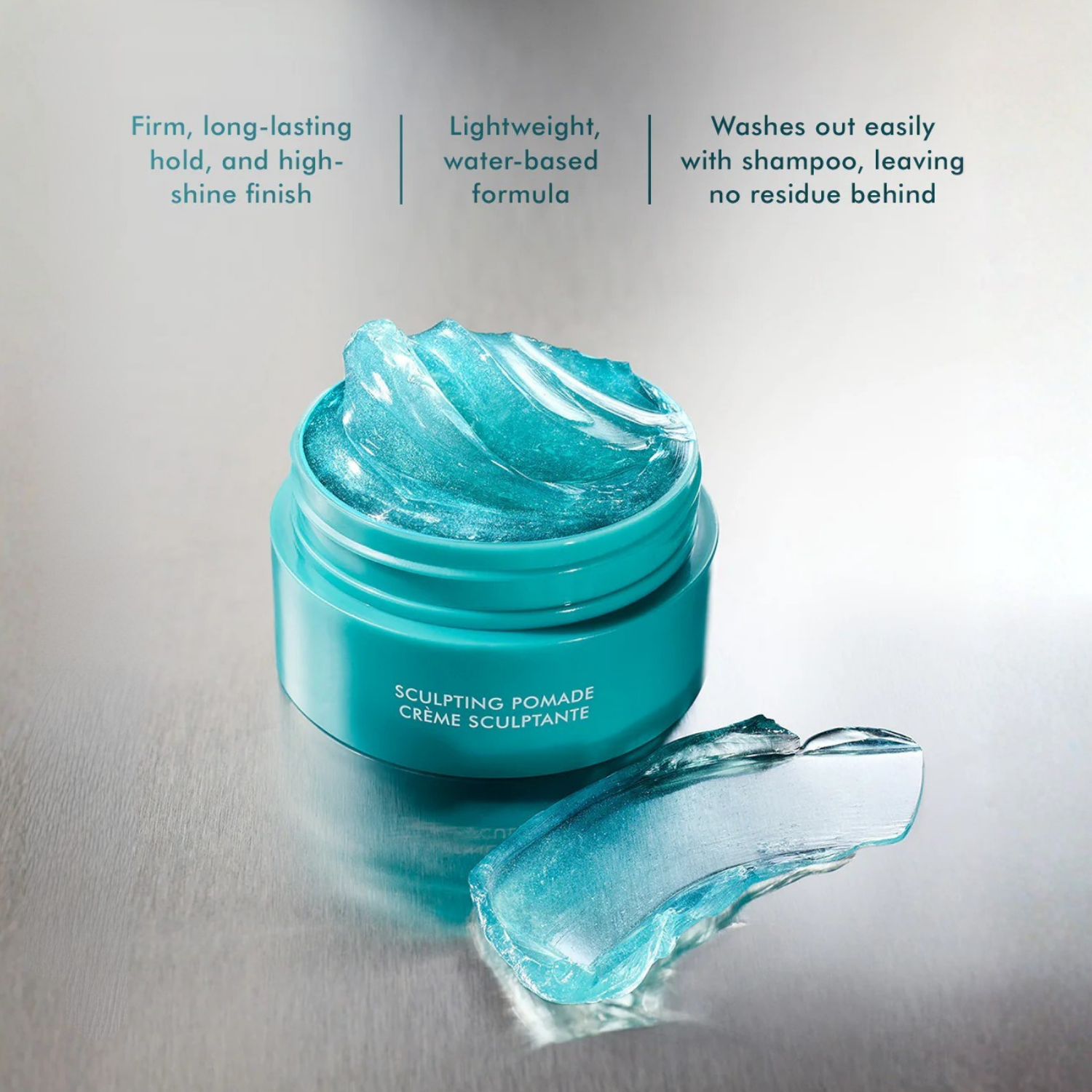 Pot de Moroccanoil Sculpting Pomade 75ml pour coiffage haute tenue avec fini brillant et formule enrichie en huile d’argan.