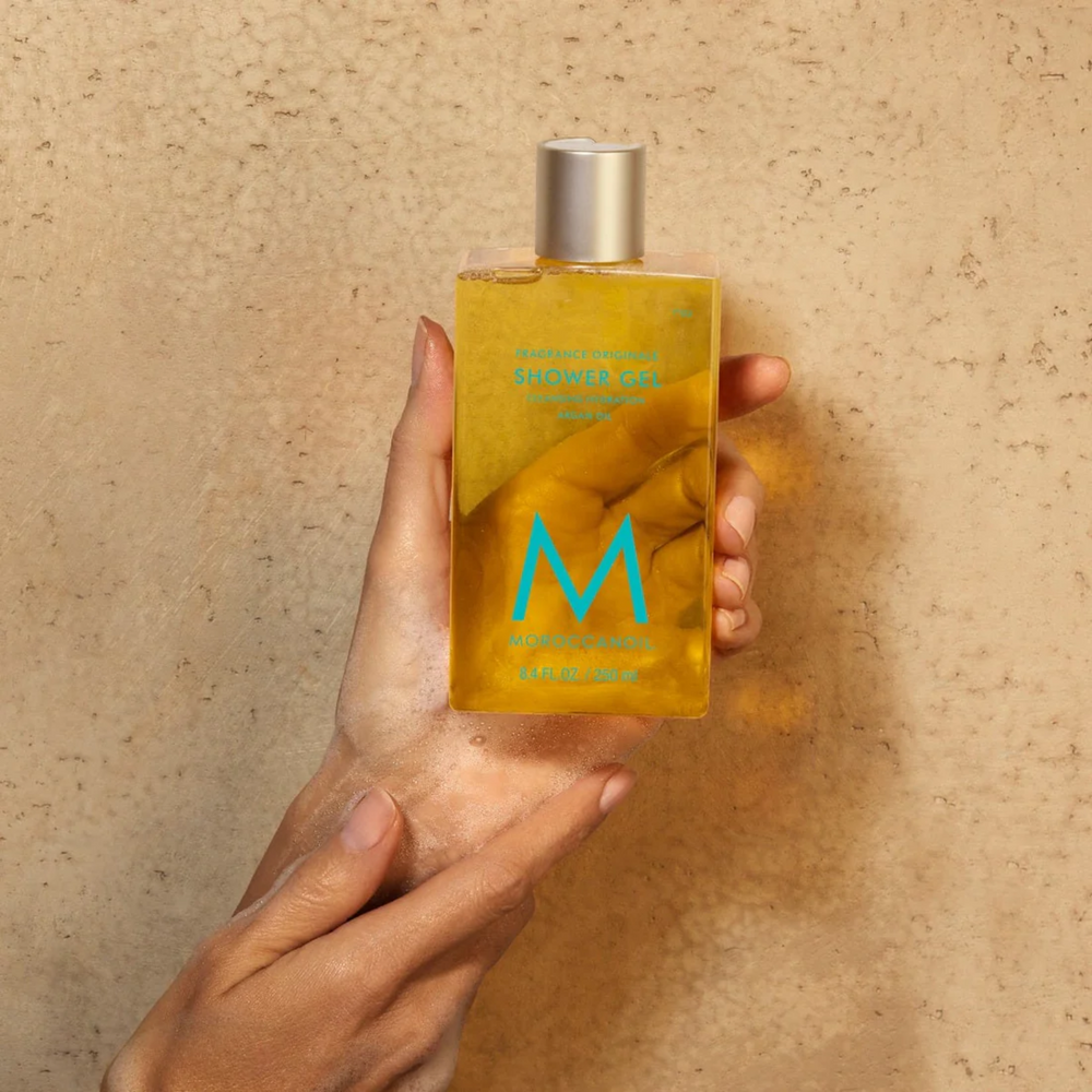 Flacon 250 ml du Moroccanoil Shower Gel Fragrance Originale – gel douche hydratant à l’huile d’argan parfum signature ambre, magnolia, bois.

