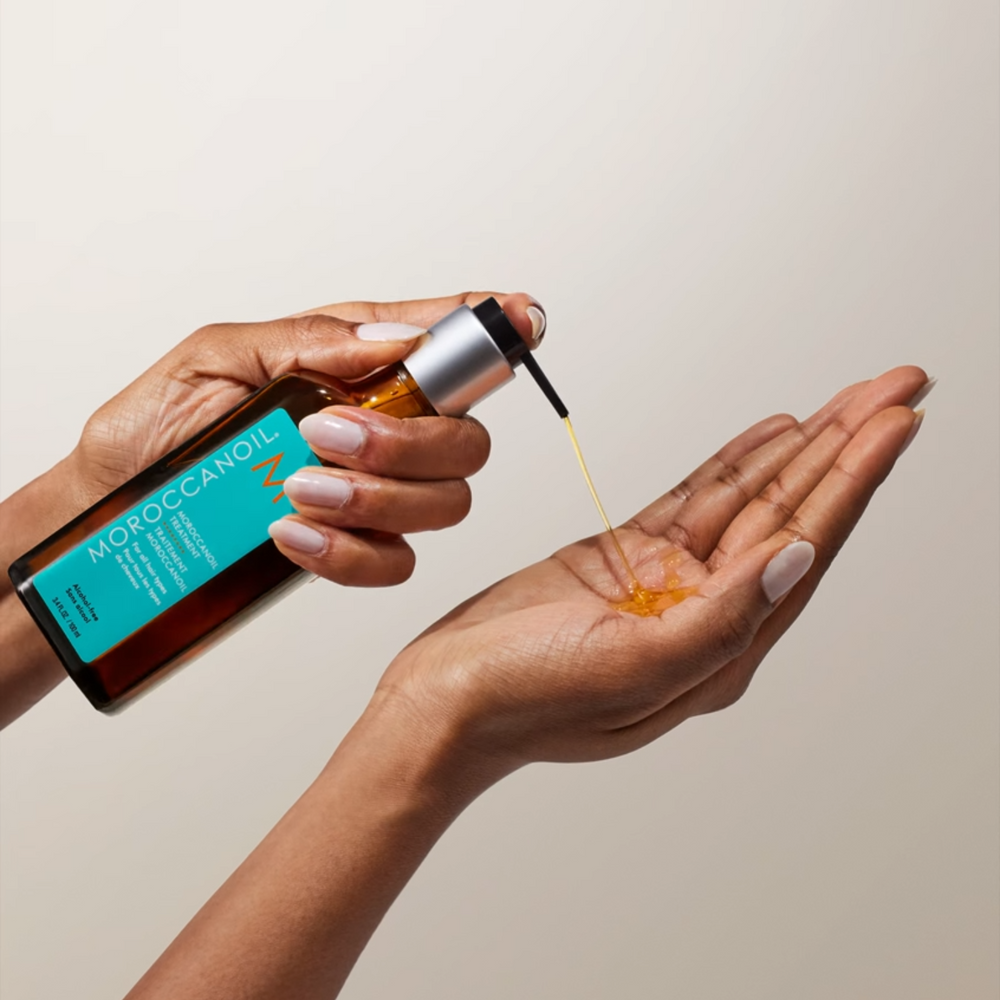 Flacon Moroccanoil® Traitement Original avec pompe et huile dorée


