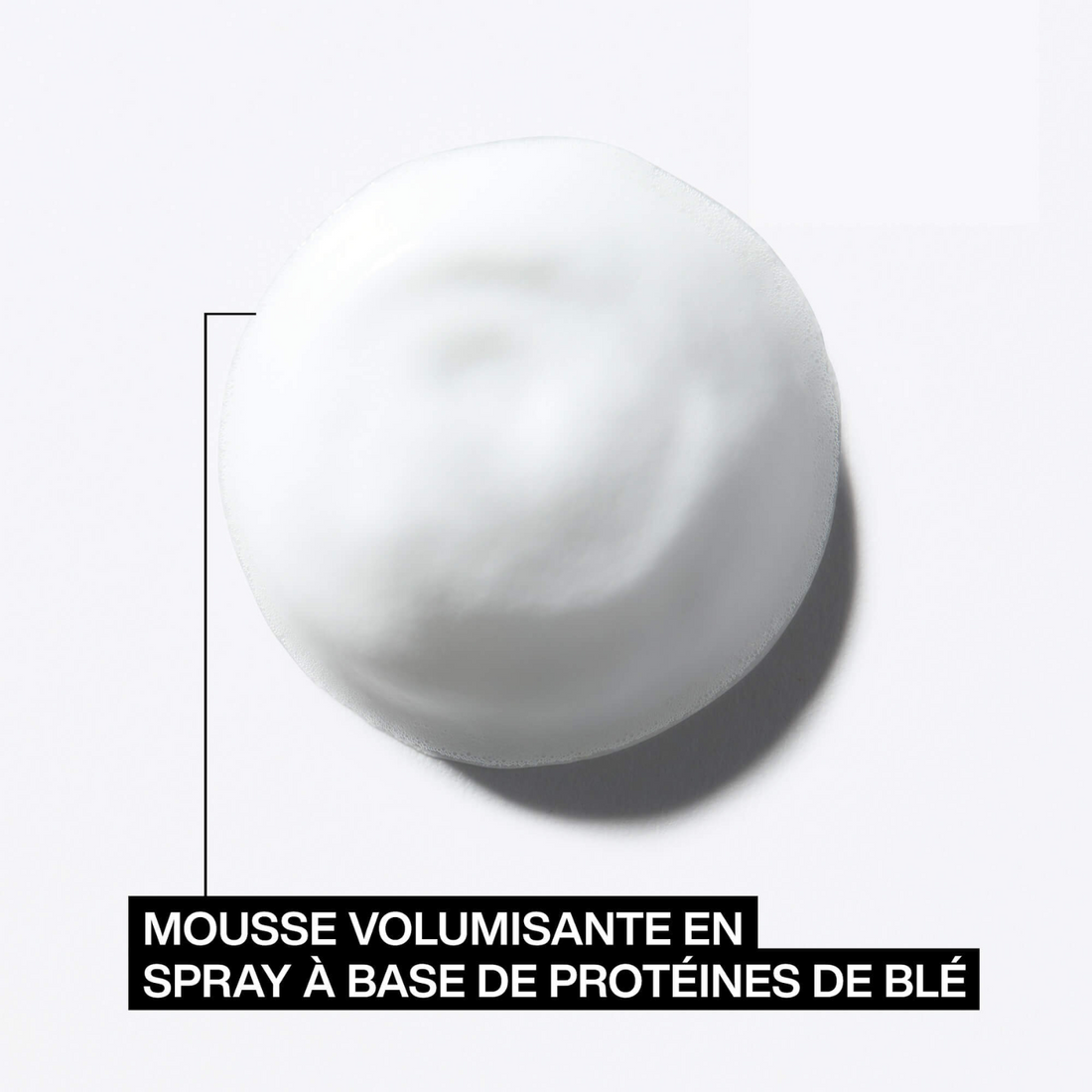 Flacon mousse-spray Root Lifter (Guts 10) de Redken, posé sur fond neutre.