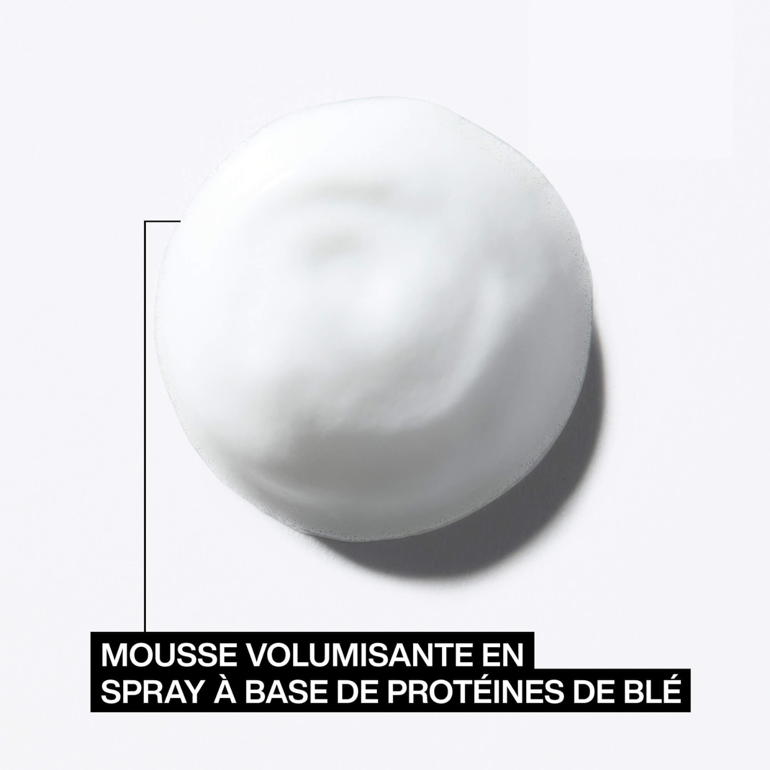 Flacon mousse-spray Root Lifter (Guts 10) de Redken, posé sur fond neutre.