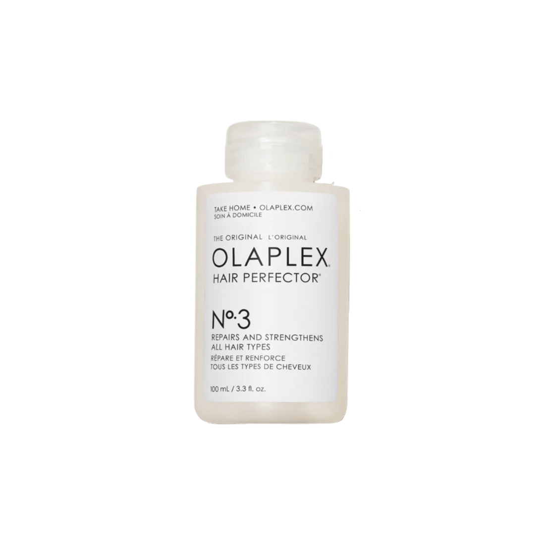 Flacon du traitement Olaplex N° 3 Hair Perfector posé sur fond neutre