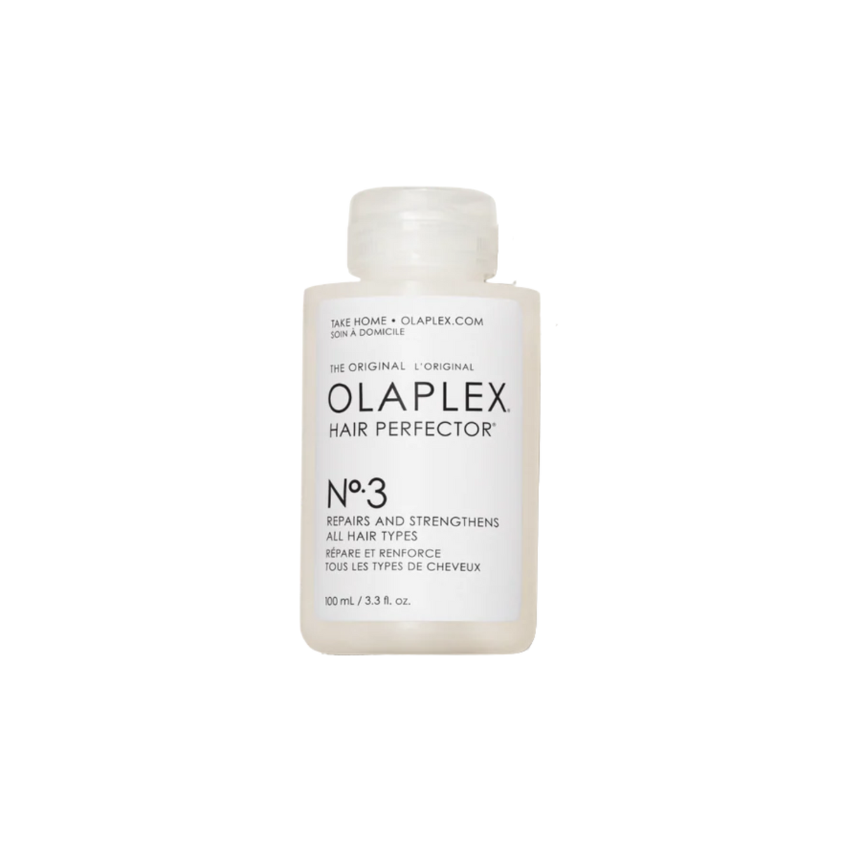 Flacon du traitement Olaplex N° 3 Hair Perfector posé sur fond neutre