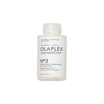 Flacon du traitement Olaplex N° 3 Hair Perfector posé sur fond neutre
