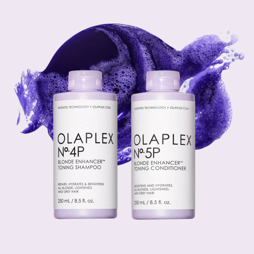 Flacon du shampooing Olaplex N° 4P Blonde Enhancer posé sur fond neutre