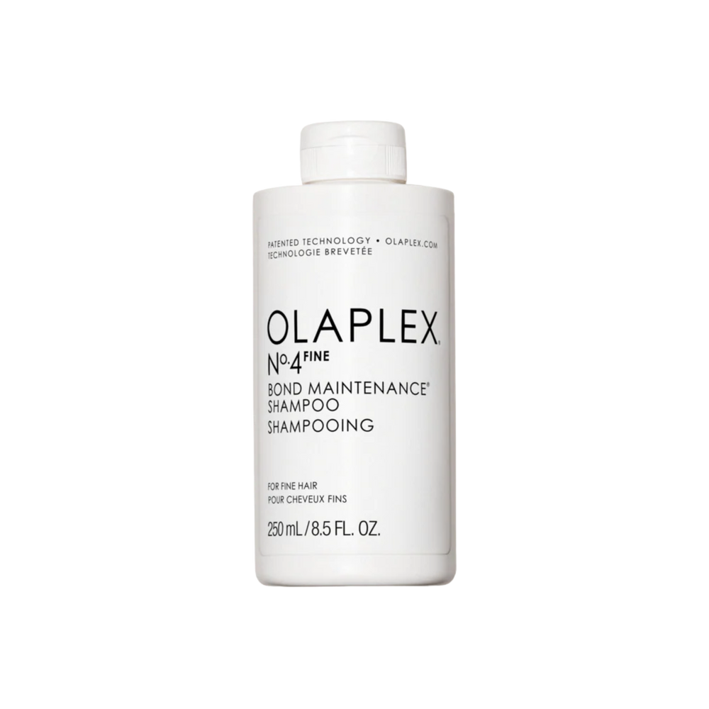 Flacon du shampooing Olaplex N° 4 Fine Bond Maintenance sur fond neutre