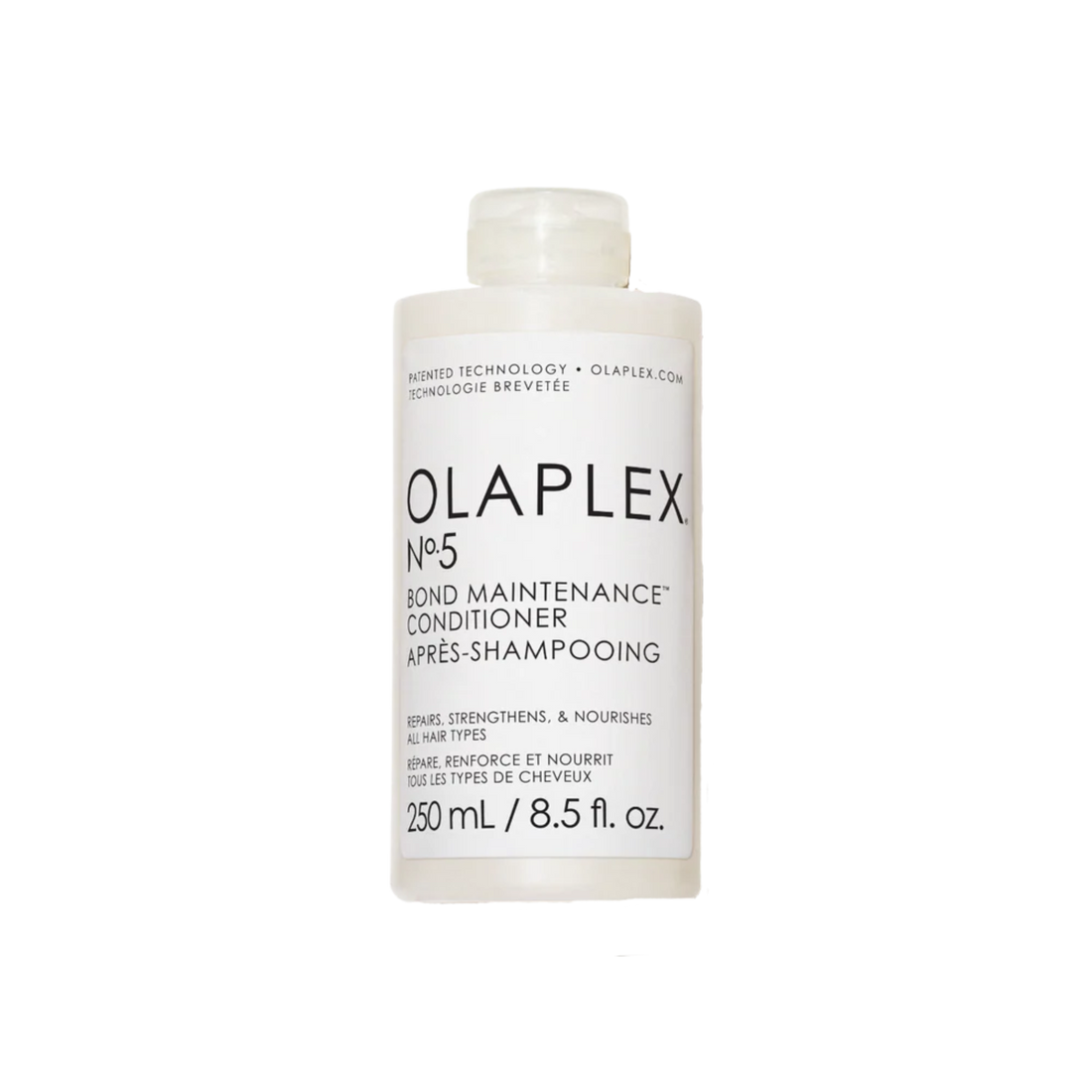 Flacon du conditionneur Olaplex N° 5 Bond Maintenance posé sur fond neutre