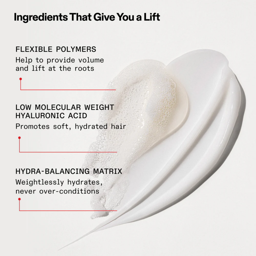 Flacon du conditionneur Olaplex N° 5 Fine Bond Maintenance posé sur fond neutre