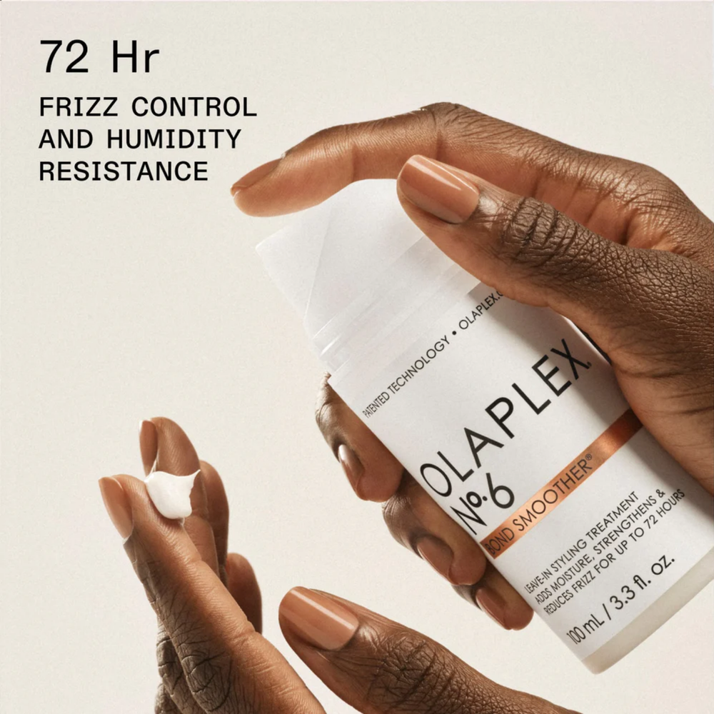 Tube de la crème coiffante Olaplex N° 6 Bond Smoother posé sur fond neutre