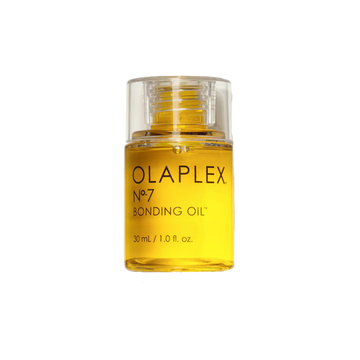 Flacon de l’huile coiffante Olaplex N° 7 Bonding Oil posé sur fond neutre