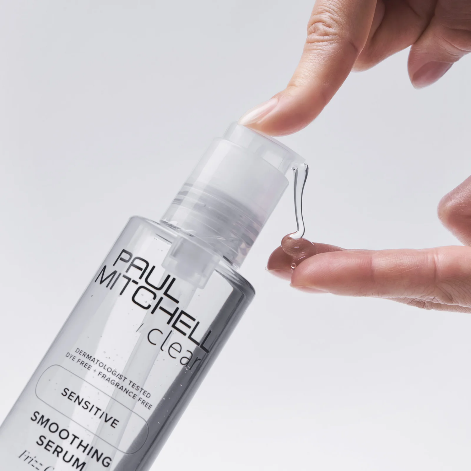 Sérum lissant Paul Mitchell Clear Smoothing Serum sans parfum, anti-frisottis léger pour cheveux, brillance et coiffage facile cheveux sensibles.