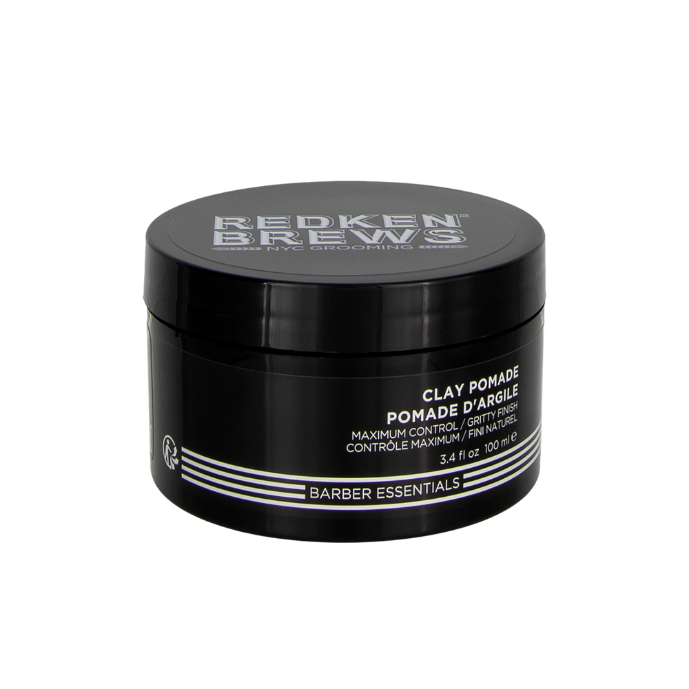 Pot de 100 ml de pommade d’argile Redken Brews, texture mate, fini brut, coiffant tenace pour cheveux fins.