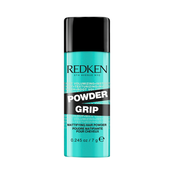 Poudre capillaire Redken Powder Grip 03 posée sur fond clair.