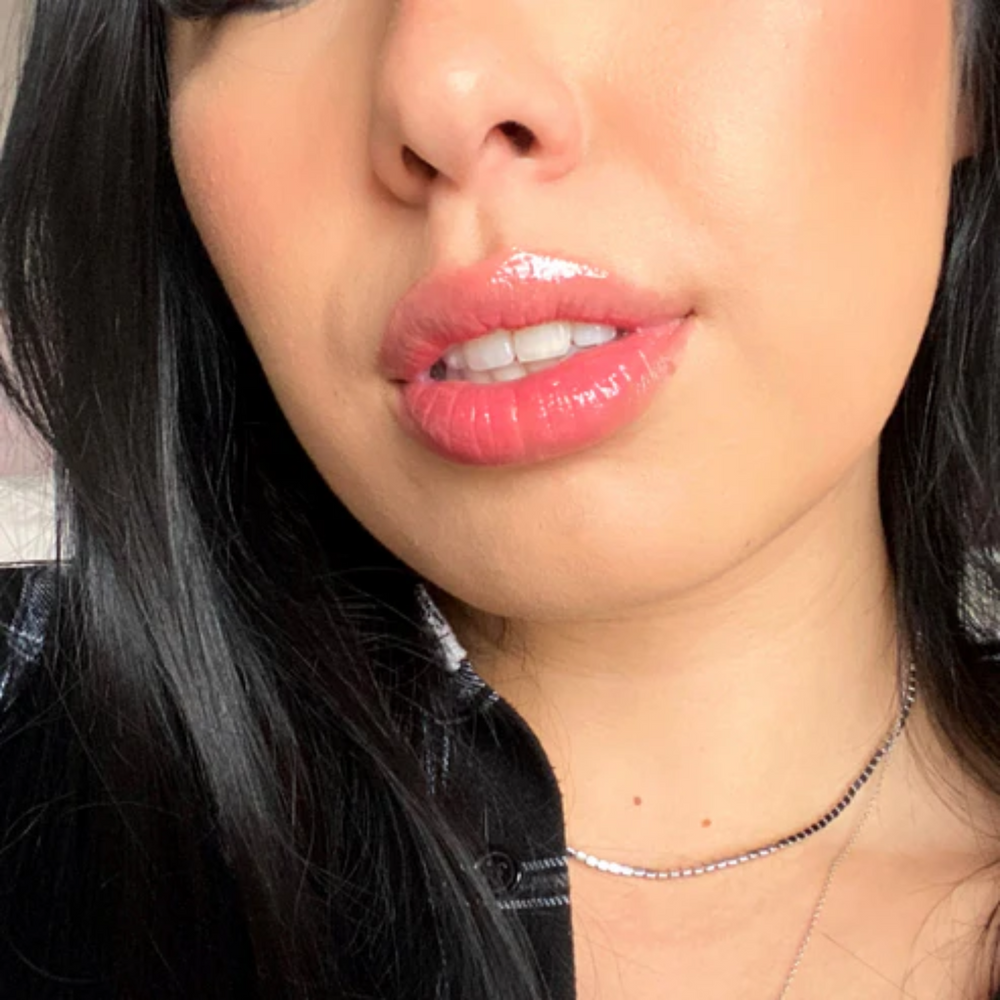 Tube 5 ml Princess Pink Tinted Lip Oil Refreshi, texture brillante non collante, teinte rose délicate, bulles anti‑débordement

