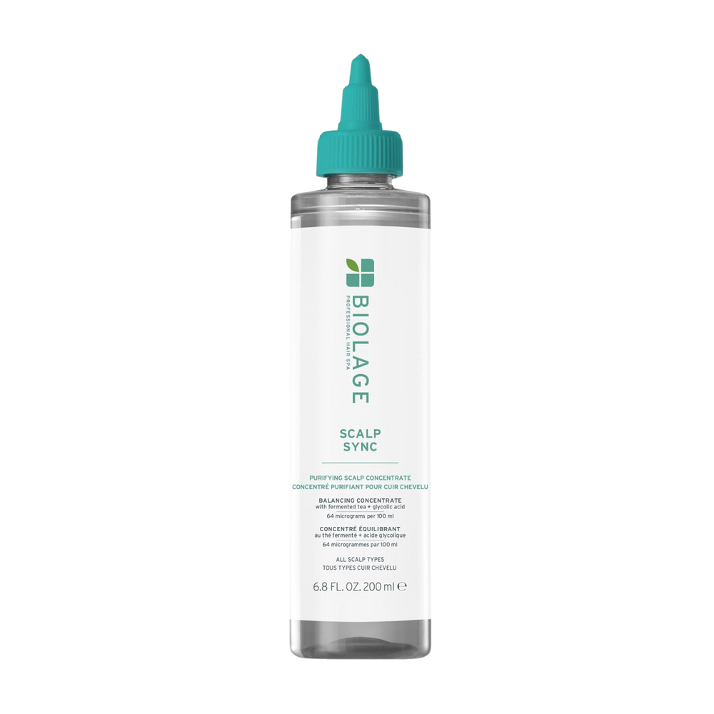 Flacon du Purifying Scalp Concentrate Biolage Scalp Sync, traitement exfoliant pré‑shampooing au thé fermenté et acide glycolique, pour cuir chevelu clarifié et rafraîchi.