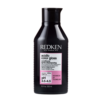 Flacon de l’après‑shampooing Redken Acidic Color Gloss posé sur fond neutre, packaging professionnel