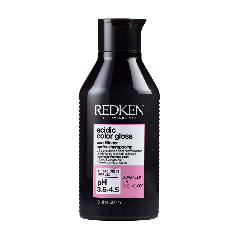 Flacon de l’après‑shampooing Redken Acidic Color Gloss posé sur fond neutre, packaging professionnel