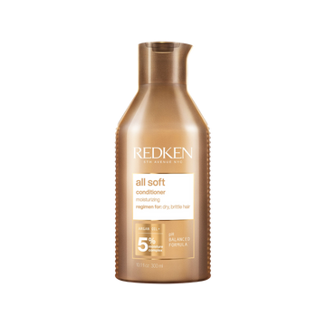 Flacon du Redken All Soft Conditioner, soin démêlant nourrissant pour cheveux secs et abîmés.