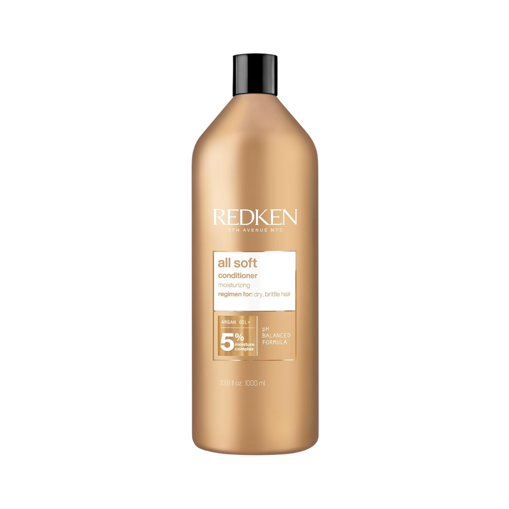 Flacon du Redken All Soft Conditioner, soin démêlant nourrissant pour cheveux secs et abîmés.