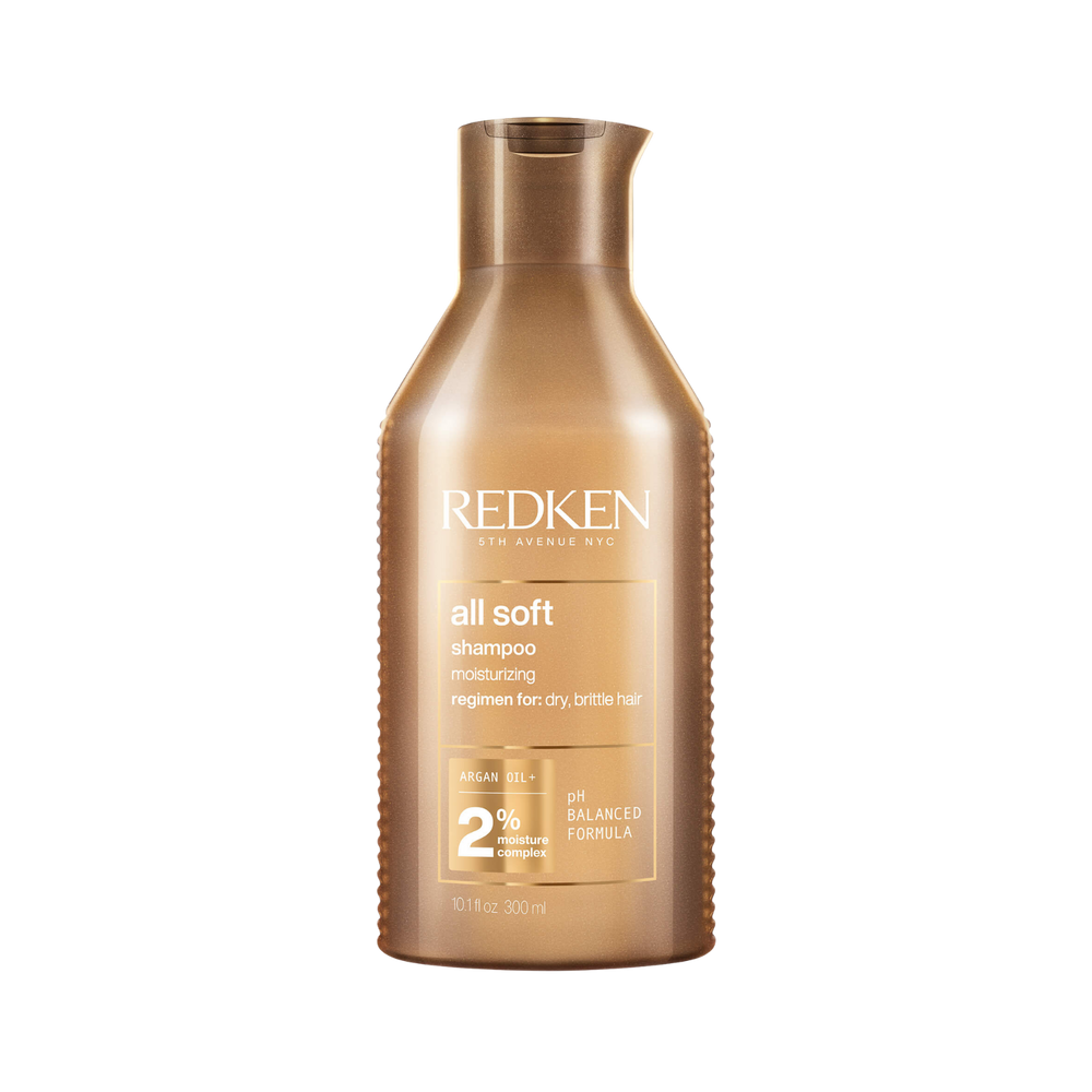 Flacon de Redken All Soft Shampoo, shampooing adoucissant à l’huile d’argan pour cheveux secs et abîmés.