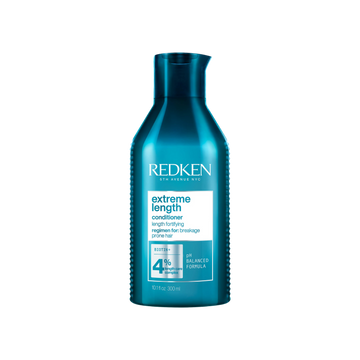 Flacon de Redken Extreme Length Conditioner, format revitalisant fortifiant enrichi en biotine et huile de ricin pour cheveux longs