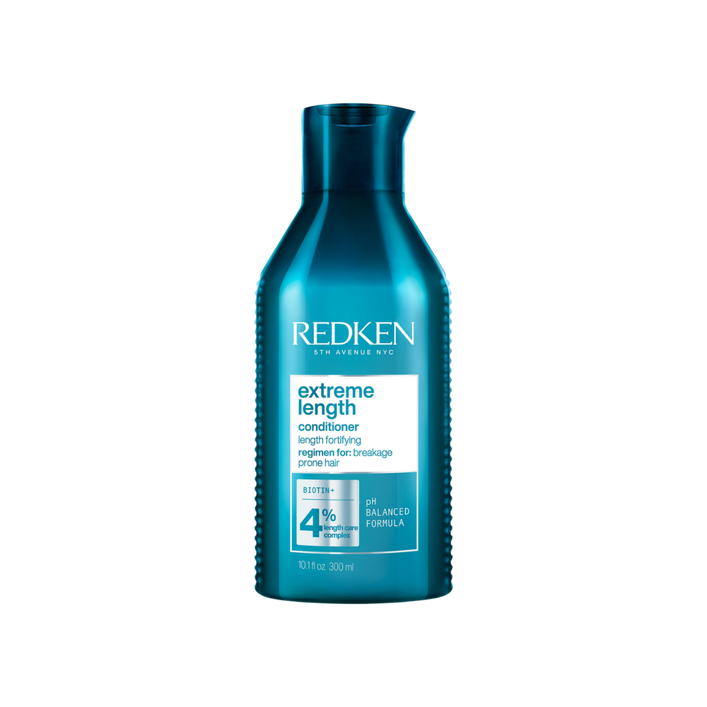 Flacon de Redken Extreme Length Conditioner, format revitalisant fortifiant enrichi en biotine et huile de ricin pour cheveux longs