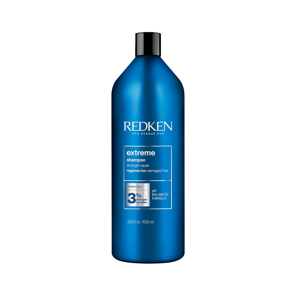 Flacon Redken Extreme Shampoo pour cheveux abîmés, réparation.