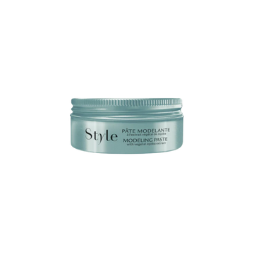 Pot de 75 ml de pâte modelante René Furterer Style, pour un coiffage naturel et durable.

