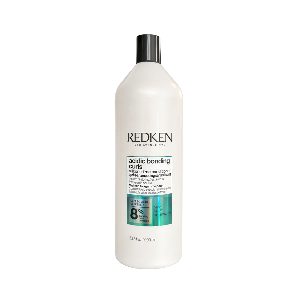 Flacon du revitalisant Acidic Bonding Curls Redken pour cheveux bouclés, sans silicone. 