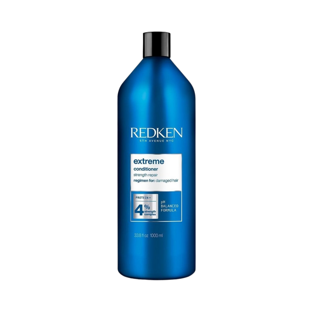 Flacon du Revitalisant Fortifiant Extreme de Redken pour cheveux abîmés