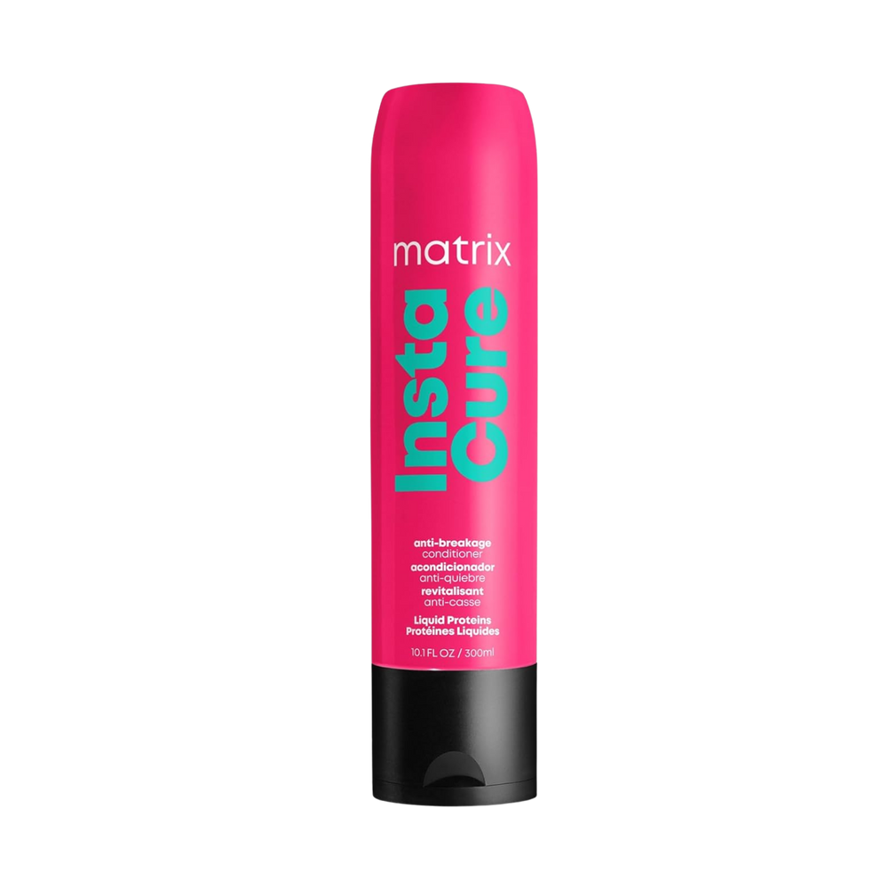 “Flacon 1000 ml du revitalisant anti‑casse Instacure de Matrix — tube crème blanc avec logo noir et accents verts”