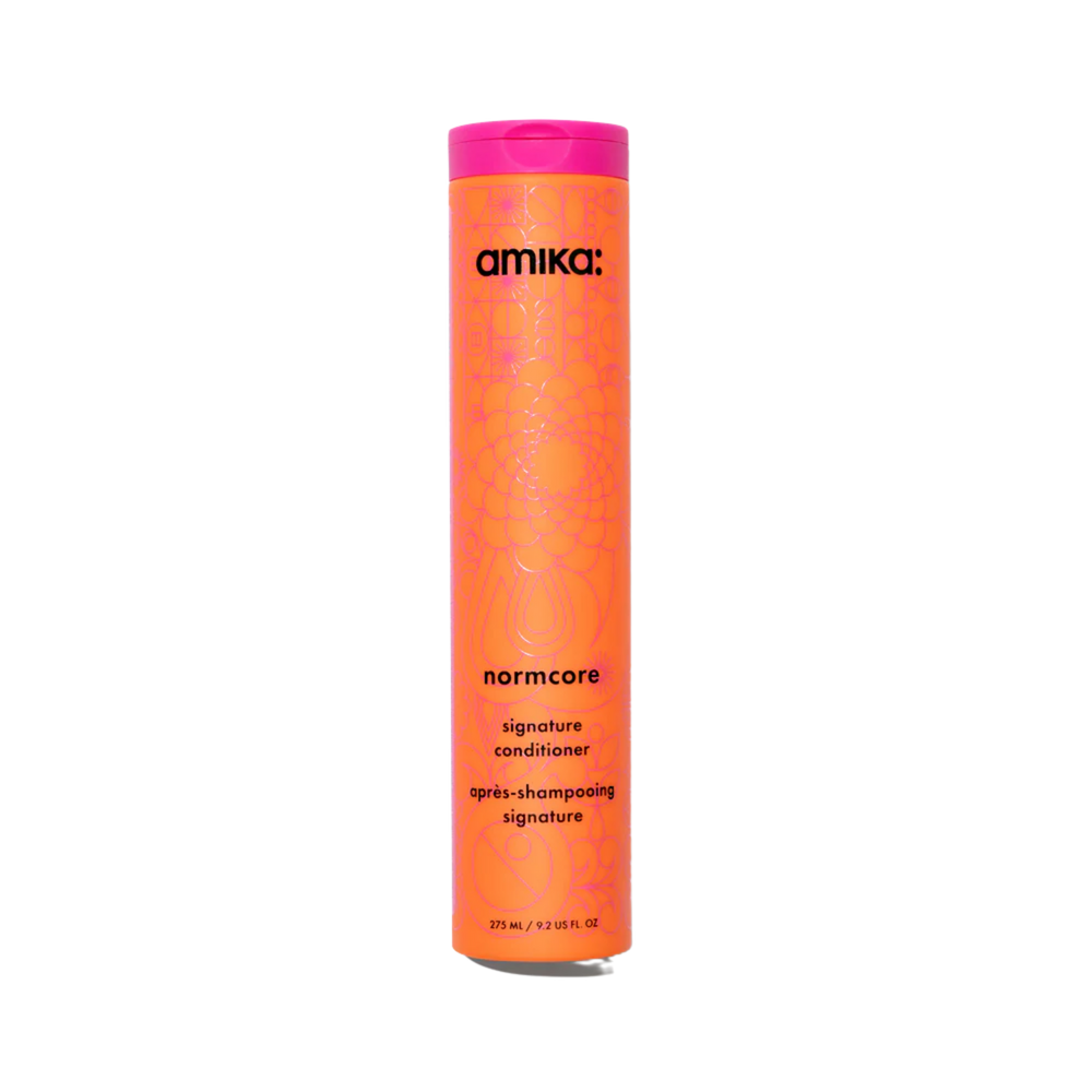 Flacon du revitalisant amika Normcore pour hydratation quotidienne et douceur

