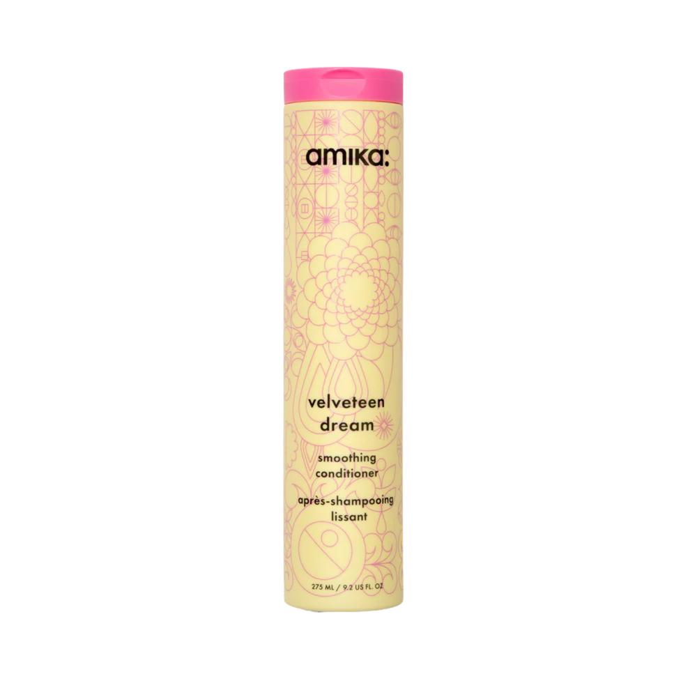 Flacon du revitalisant amika Velveteen Dream pour cheveux lisses et sans frisottis


