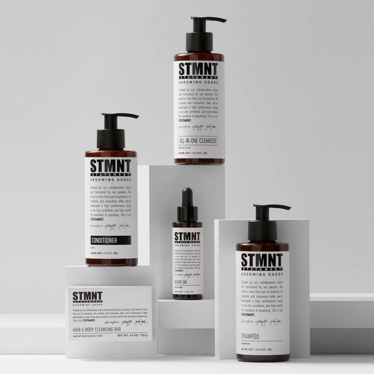 Flacon STMNT Bain Tout‑en‑Un 750 ml – nettoyant multi‑usage cheveux barbe corps