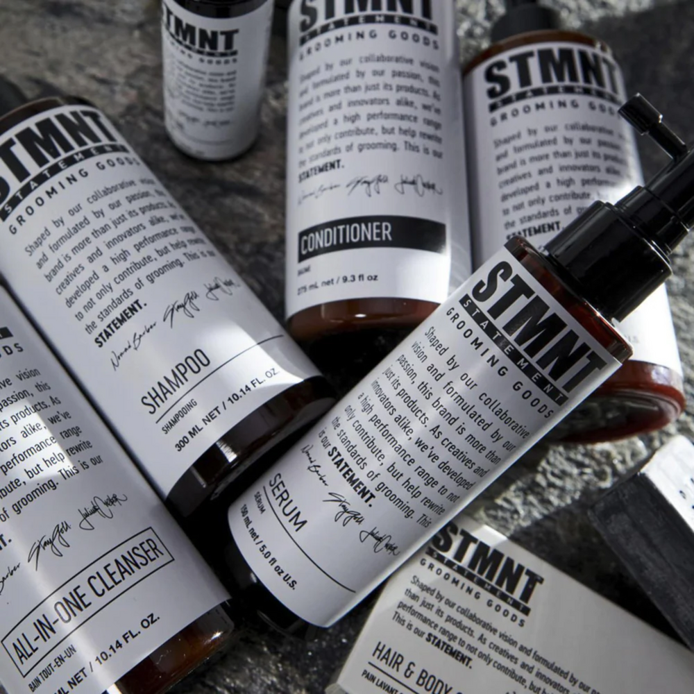 Flacon STMNT Bain Tout‑en‑Un 750 ml – nettoyant multi‑usage cheveux barbe corps