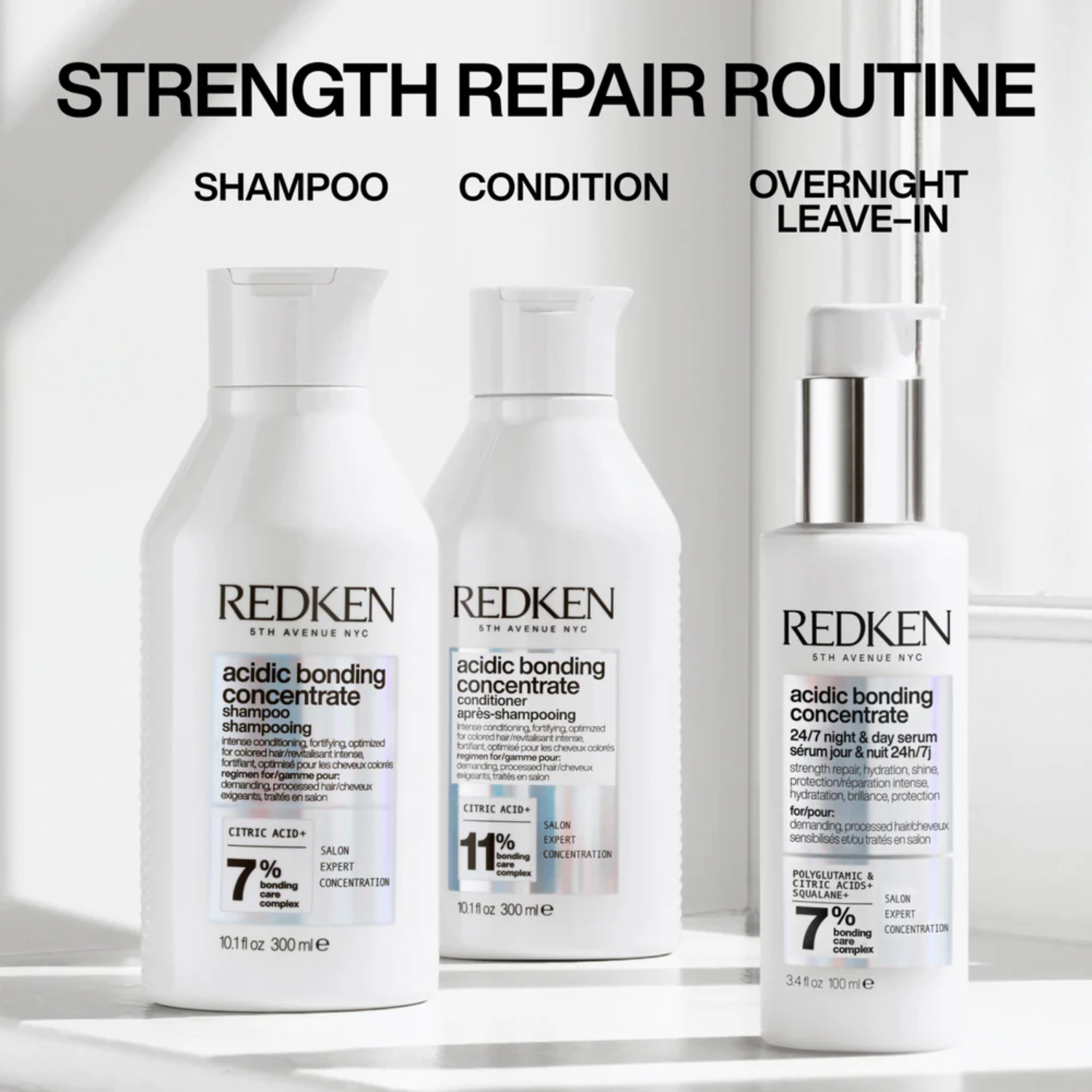 Flacon du sérum jour et nuit Redken Acidic Bonding Concentrate posé sur fond neutre.