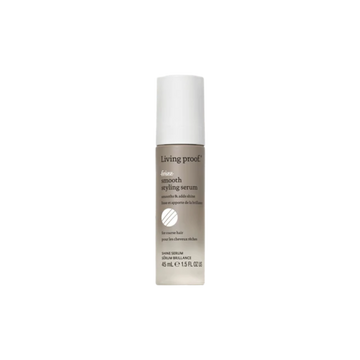Petite bouteille claire du sérum No Frizz Smooth Styling Serum, design épuré clair, suggérant lissage, brillance et contrôle des frisottis.


