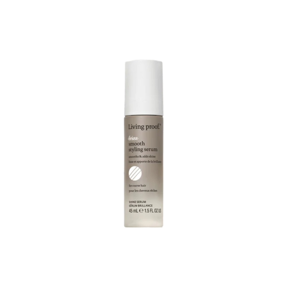 Petite bouteille claire du sérum No Frizz Smooth Styling Serum, design épuré clair, suggérant lissage, brillance et contrôle des frisottis.

