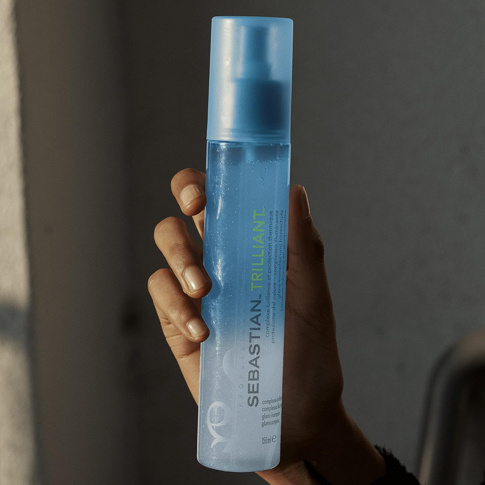 Flacon spray de 150 ml Trilliant de Sebastian, spray thermo-protecteur pour brillance éclatante.

