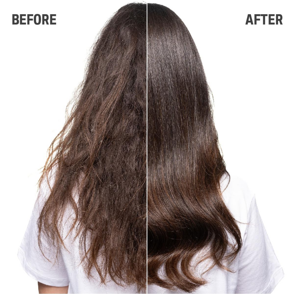 Flacon de 1000 ml du shampoing Goldwell Dualsenses Just Smooth Taming Shampoo pour cheveux indisciplinés