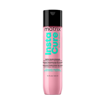 “Flacon de shampoing Instacure Build‑A‑Bond Matrix — étiquette rose pâle avec logo Matrix”