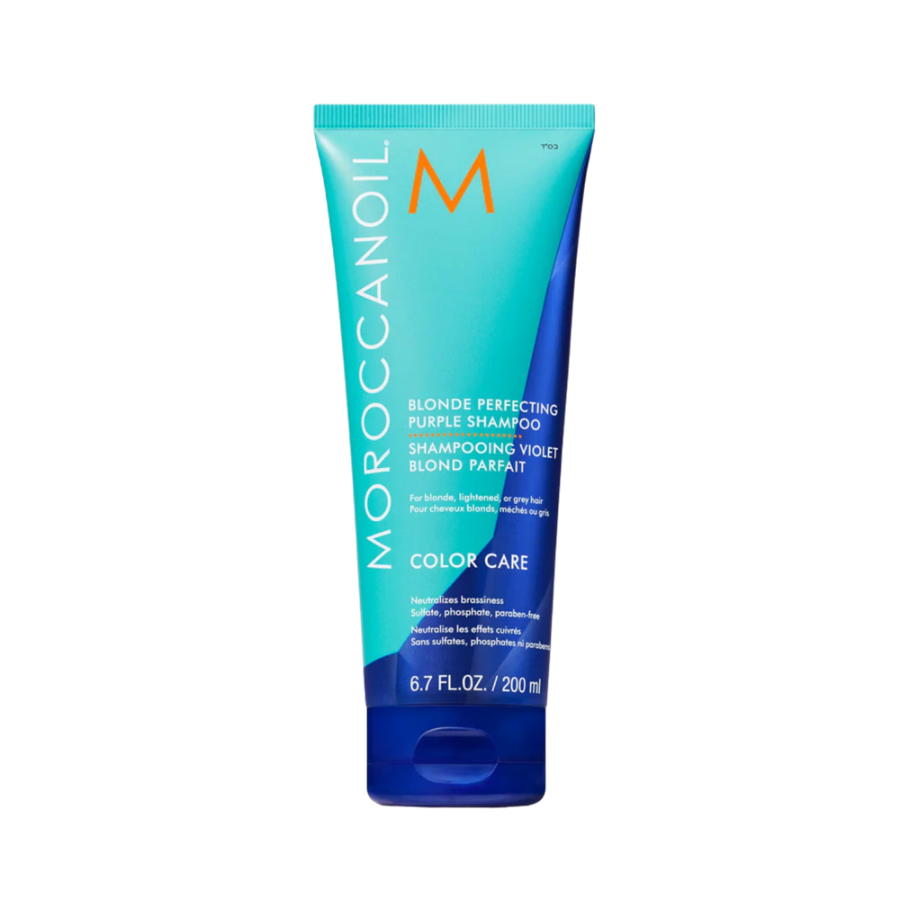 Flacon du Shampoing Violet Moroccanoil – fini violet, conçu pour neutraliser les reflets jaunes et garder les tons blonds frais.

